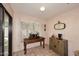 The dining room features a wooden table and a bright window at 9115 N 101St Way, Scottsdale, AZ 85258