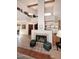 Living room boasts a fireplace, vaulted ceilings, and plenty of natural light at 9115 N 101St Way, Scottsdale, AZ 85258