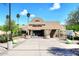 Scottsdale Ranch Park Tennis Center featuring a modern building, entrance, and lush landscaping at 9115 N 101St Way, Scottsdale, AZ 85258