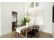 Elegant dining room featuring modern chandelier, with natural light, and stylish decor at 9224 E Windrose Dr, Scottsdale, AZ 85260