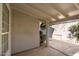 Covered patio with open access to the backyard at 9224 E Windrose Dr, Scottsdale, AZ 85260