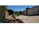 Large backyard with a covered patio, perfect for entertaining or relaxing in the shade at 949 N Ricardo N Cir, Mesa, AZ 85205