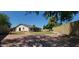 Spacious backyard with brick paved area, perfect for outdoor entertaining and relaxation at 949 N Ricardo N Cir, Mesa, AZ 85205