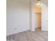 Bright bedroom features a closet, neutral walls and modern gray flooring at 10526 W Tonopah Dr, Peoria, AZ 85382
