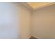 Closet features a shelf and rod with neutral colored walls at 10526 W Tonopah Dr, Peoria, AZ 85382