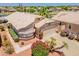 Charming home featuring a two-car garage, meticulous landscaping and a tile roof at 10526 W Tonopah Dr, Peoria, AZ 85382