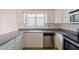 Bright kitchen with stainless steel appliances and updated cabinetry at 10526 W Tonopah Dr, Peoria, AZ 85382