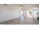 Spacious main bedroom featuring a ceiling fan and access to an outdoor patio at 10526 W Tonopah Dr, Peoria, AZ 85382