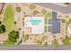 Aerial view of a community pool surrounded by desert landscaping and a parking area at 10526 W Tonopah Dr, Peoria, AZ 85382