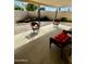 Covered patio with outdoor seating, perfect for relaxation and entertaining at 10647 W Campana Dr, Sun City, AZ 85351