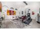 Bright living room with tile floors, high ceilings and chic decor at 10662 E Carol Ave, Scottsdale, AZ 85258