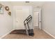 Spare room featuring a treadmill, carpet flooring, neutral walls, and closet doors at 10718 E Vivid Ave, Mesa, AZ 85212