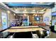 Bright community playroom featuring games, tables, and a playful, colorful design at 10718 E Vivid Ave, Mesa, AZ 85212