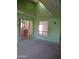Bright sunroom with large windows and sliding glass doors offering natural light at 10721 W Mission Ln, Sun City, AZ 85351
