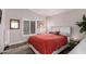 Comfortable bedroom with natural light, neutral decor and a colorful accent rug at 1120 N Val Vista Dr # 113, Gilbert, AZ 85234
