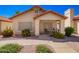 Charming single-story home with desert landscaping and a cozy front porch seating area at 1120 N Val Vista Dr # 113, Gilbert, AZ 85234