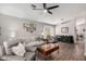 Cozy living room features wood floors, ceiling fan and a bay window at 1120 N Val Vista Dr # 113, Gilbert, AZ 85234