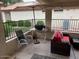 Comfortable patio features seating, umbrella, and outdoor living space at 1120 N Val Vista Dr # 113, Gilbert, AZ 85234