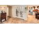 Foyer featuring elegant tile flooring that leads to the gourmet kitchen, showcasing a modern and inviting space at 12927 W Shadow Hills Dr, Sun City West, AZ 85375