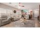 Open-concept living area with tile flooring, recessed lighting, and comfortable seating arrangement at 1325 E Linda Dr, Casa Grande, AZ 85122