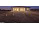 Exterior of house boasting a covered back patio, ideal for outdoor entertaining at 13430 S Garnet Rd, Buckeye, AZ 85326