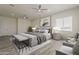 Well-lit main bedroom with a king-sized bed and stylish decor at 13430 S Garnet Rd, Buckeye, AZ 85326