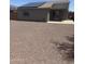 This home has a private backyard with patio, low maintenance landscaping, and solar panels on the roof at 14038 N 162Nd Ln, Surprise, AZ 85379