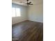 Comfortable bedroom with a ceiling fan and neutral color palette at 14038 N 162Nd Ln, Surprise, AZ 85379