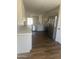 Open-concept kitchen with stainless steel appliances and a bright, airy feel, perfect for entertaining at 14038 N 162Nd Ln, Surprise, AZ 85379