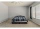 Large, bright bedroom with carpet and natural lighting, offering a serene and inviting space at 15655 W Berkeley Rd, Goodyear, AZ 85395