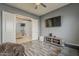 Home features a bonus room that includes a media center and leads into an additional sitting area at 15655 W Berkeley Rd, Goodyear, AZ 85395