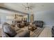 Spacious living room with comfortable sofas and an open layout, ideal for entertaining guests or enjoying Gathering time at 15655 W Berkeley Rd, Goodyear, AZ 85395