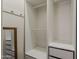 Bright walk-in closet featuring custom shelving and drawers for optimal organization and storage space at 15655 W Berkeley Rd, Goodyear, AZ 85395