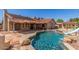 Expansive backyard features a private pool, mature landscaping, and ample patio space for entertaining at 15825 N 45Th St, Phoenix, AZ 85032