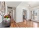 Inviting entryway features wood floors, neutral walls, and bright natural light at 15825 N 45Th St, Phoenix, AZ 85032