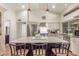 Modern kitchen features stainless appliances, an island with seating, and white cabinets at 15825 N 45Th St, Phoenix, AZ 85032