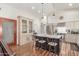 Kitchen showcases an island with seating, stainless steel appliances, and ample cabinet space at 15825 N 45Th St, Phoenix, AZ 85032