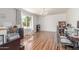Home office featuring a chandelier, large window, and hardwood floors at 15825 N 45Th St, Phoenix, AZ 85032
