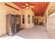 Outdoor covered patio with a refrigerator, ceiling fan, and wood ceiling, perfect for entertaining at 15825 N 45Th St, Phoenix, AZ 85032