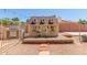 Exterior of a charming playhouse with a wood deck, cute shutters, and a miniature front door at 15825 N 45Th St, Phoenix, AZ 85032