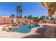 Resort-style pool features a waterfall, two water slides, desert landscaping, and an outdoor fireplace at 15825 N 45Th St, Phoenix, AZ 85032