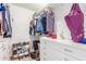 Organized walk-in closet with custom shelving and ample storage space for clothes and shoes at 15825 N 45Th St, Phoenix, AZ 85032