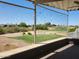 Back porch with a beautiful view of a golf course and a neighborhood surrounded by desert landscaping at 17200 W Bell Rd # 1279, Surprise, AZ 85374