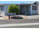 Charming single-story home featuring a covered parking and well-maintained landscaping in a peaceful neighborhood at 17200 W Bell Rd # 1279, Surprise, AZ 85374