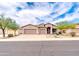 Charming single-Gathering home features a three-car garage, desert landscaping, and a welcoming entrance at 18633 W Mcneil St, Goodyear, AZ 85338