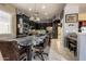 This gourmet kitchen features a large island, seating for four, and stainless steel appliances at 18633 W Mcneil St, Goodyear, AZ 85338