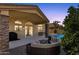 Inviting back patio with comfortable seating, and views of the refreshing pool at 20239 N 39Th Dr, Glendale, AZ 85308