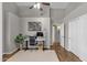 Stylish home office features wood floors, neutral walls, and a modern desk setup at 20239 N 39Th Dr, Glendale, AZ 85308
