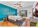 A serene main bedroom offers a king-size bed, stylish decor, and a large window for natural light at 2103 E Canyon Pl, Chandler, AZ 85249