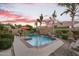 Relaxing backyard features a pool, mature landscaping, patio and furniture, ideal for outdoor living at 2103 E Canyon Pl, Chandler, AZ 85249